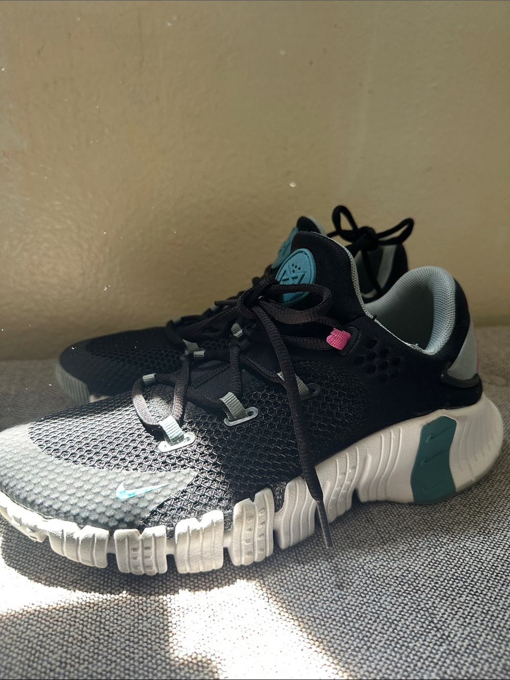 Nike Women’s Free Metcon Black Sneakers with Teal and Pink Accents